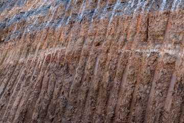Soil gravel layer under the road, which was dug.