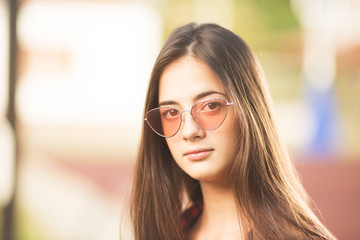 Beautiful teenage girl with sunglasses