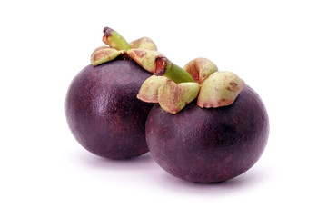 Mangosteen isolated on white background. Mangosteen, the famous exotic delicious tropical fruits from Thailand. Mangosteen also known as Queen of fruits.