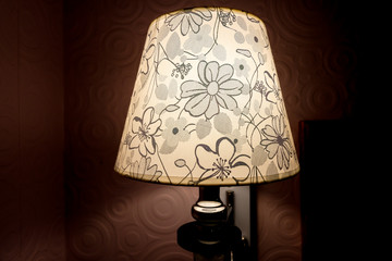 Ancient lamps shine in the bedroom at night.