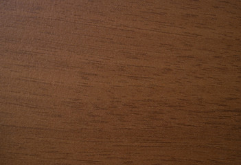 A rich dark wood texture  background with heavy grain