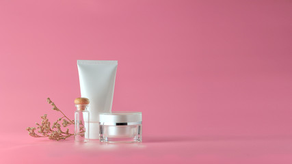 Set of cosmetic products on a color background. Cosmetic package collection for cream, soups, foams, shampoo.Natural beauty blank label for branding mock-up concept.