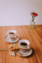 Christmas Cozy Table, Chrismas Decoration With Coffee and Tea, Mugs, Plants and Flowers, Notebook