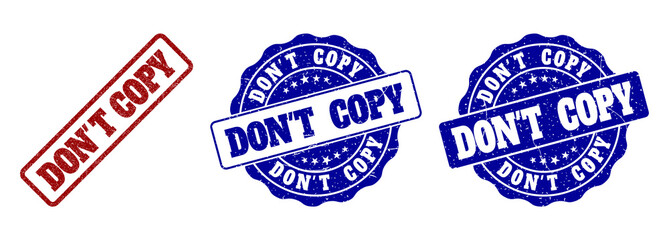 DON'T COPY grunge stamp seals in red and blue colors. Vector DON'T COPY labels with grunge effect. Graphic elements are rounded rectangles, rosettes, circles and text labels.