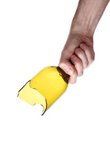 Human hand holding a broken glass bottle