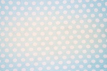White dots pattern on blue background. 