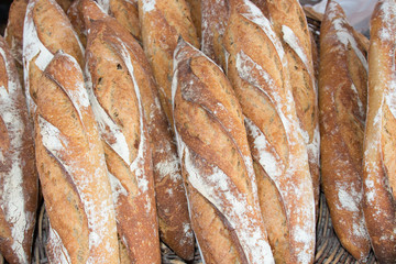French bread sticks freshly out of the oven on wallpaper background