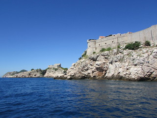 Fototapeta na wymiar Fantastic view to Dubrovnik old town wall from the adriatic sea, Croatia