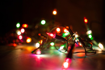 colorful pink, green and blue holiday lights Christmas background