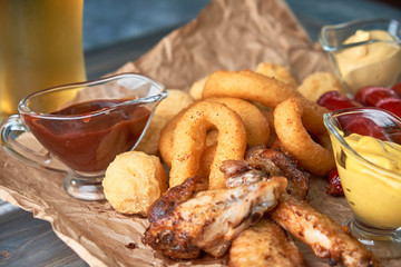 Grilled sausages with glass of beer pic