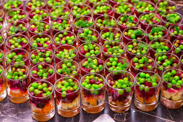 Fototapeta na wymiar vegetable salads in a glass on a buffet table