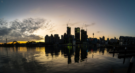 Fototapeta premium Sydney city in silhouette at sunrise