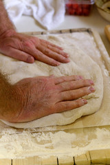 Man Kneading Bread Dough