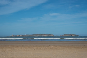 View to Mogador island from Essaouira sand city beach, Morocco