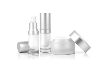 Mock up two empty container cream pump bottle and a cream jar for cosmetic is uncover , isolated on...