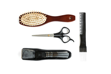 Clippers, scissors and comb isolated on white. Barber Tools