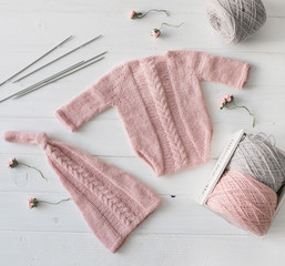 knitted handmade clothes for infant girls, topview