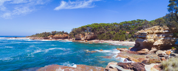 Rocky coastal cove in south coast NSW Australia panorama © Leah-Anne Thompson