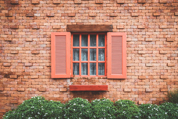 Fototapeta na wymiar vintage window on brick wall