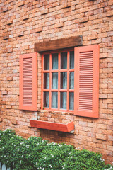 vintage window on brick wall