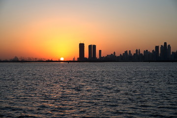 Dubai slyline from Dubai Creek Harbour and Dubai canal to Downtown and Business Bay, United Arab Emirates