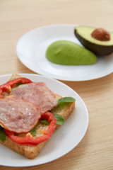 Avocado on white plate Healthy
