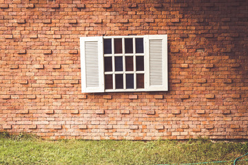 vintage window on brick wall