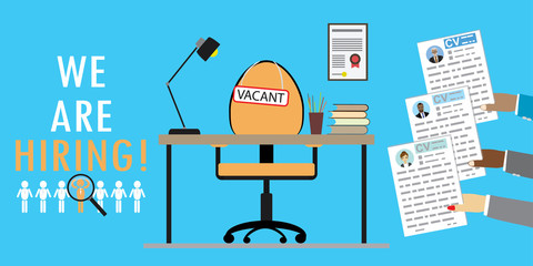 Sign vacancy on chair and inscription we're hiring,Hiring and Recruiting Concept,Work Desk