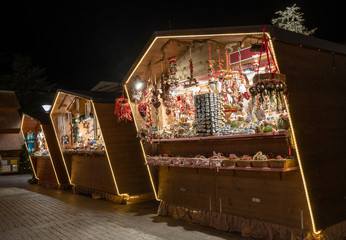 Christmas market booth in Merano south tyrol italy - obrazy, fototapety, plakaty
