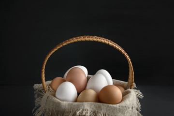 eggs in a birch-bark basket and a linen cloth