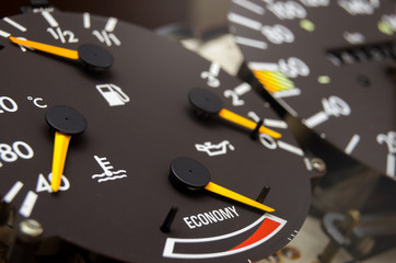 Close up shot of a speedometer in a car. Car dashboard. Dashboard details with indication lamps.Car...