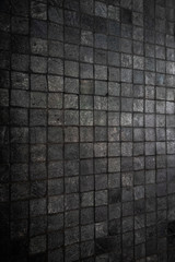 Rough dark grey mosaic tiles wall column