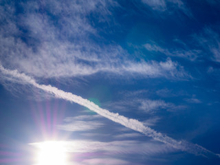 Sky with sun and clouds