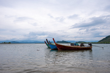 Naklejka na ściany i meble Longtail boat for travel thgailand beach 