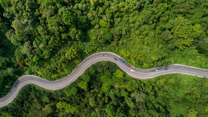 aerial view road curve construction up to mountain