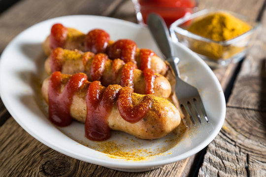 Curry Wurst. German Sausages With Ketchup And Curry