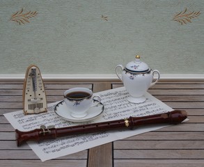 English teacup with saucer and sugar bowl, fine bone china porcelain, metronome for music and a...