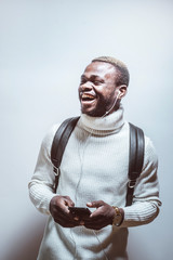African young man wearing casual outfit looking at camera