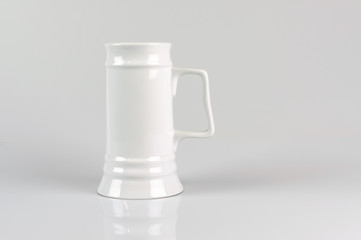 Clean white Mug of beer on white grey background