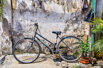 Fototapeta na wymiar Vintage old bycicle on the street