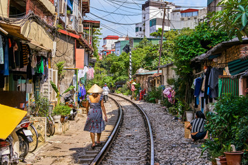 Hanoi city railway Perspective view running along narrow street with houses in Vietnam