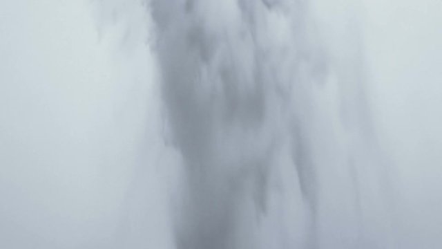 Water  falling from the cliff at Seljalandsfoss waterfalls near Vik of Iceland in the twilight time