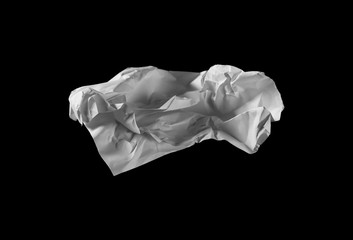 Crumpled paper isolated on black background 