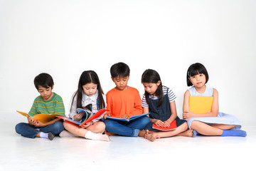 KID EDUCATION CONCEPT, READ BOOK, PLAY TOY, PLAY SMART PHONE, USE COMPUTER
