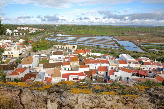 The village of Castro Marim viewed from the castle and with Sapal natural reserve in the background, Castro Marim, Algarve, Portugal