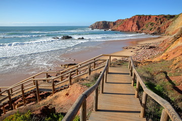 Amado beach near Carrapateira, with colorful landscape and dramatic cliffs, Costa Vicentina, Algarve, Portugal