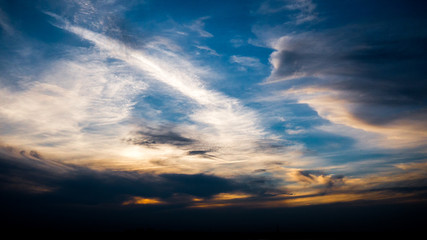 The sky breaks through the yellow clouds