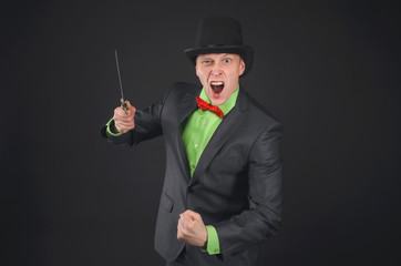 Retro style gangster man with a dagger isolated on black background.