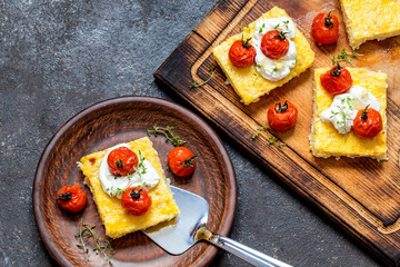 polenta with baked tomatoes and cream cheese