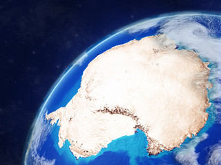 Antarctica on model of planet Earth with country borders and very detailed planet surface and clouds.